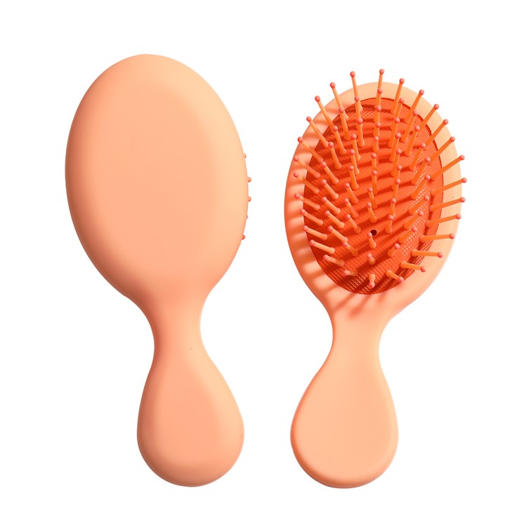 mini oval shape plastic <a href=https://www.shmetory.com/product/Mini-portable-Detangler-brush-for-wet-and-dry-hair.html target='_blank'>Detangler hair brush</a>